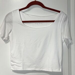 NWOT White Crop Top Size Large  P2P 16”. Length 17”. 90% Polyester 10% Spandex